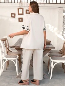 SHEIN LUNE 2 pièces Ensemble chemise à manches courtes et pantalon à taille élastique ample avec imprimé floral pour femmes grandes tailles, polyvalent et confortable pour le printemps/été - Multicolore - Voir 2