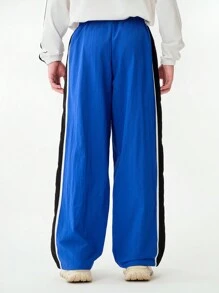 SHEIN Calça casual de perna larga com estampa de letras em bloco de cores para adolescentes