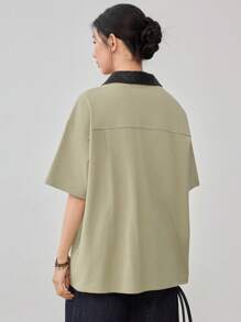 Dazy-Less Camiseta holgada de mujer con bolsillo y decoración en bloques de color contrastante
