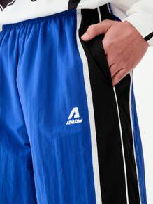 SHEIN Calça casual de perna larga com estampa de letras em bloco de cores para adolescentes