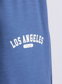 SHEIN Set de 2 piezas de sudadera con capucha suelta con estampado de letras y pantalones deportivos para niño pequeño, estilo callejero europeo y estadounidense, adecuado para uso en exteriores, vestimenta casual y uso escolar