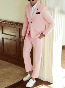 Manfinity Bizformal 男士商务派对INS套装，浅粉色西装套装，黑色衣领，精致的雄鹰标志刺绣设计。这款西装套装非常适合新年庆典、婚礼、情人节以及日常周年纪念等场合。黑色衣领增添一丝精致，而精致的标志刺绣则展现出独特的风格。这款西装让穿着者在各种场合都能展现自信魅力。男士两件套西装，粉色西装套装 - 粉色 - 查看 1