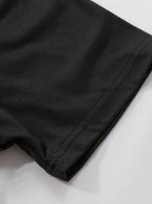 Pigiama da ragazzo pre-adolescente, con pantaloncini e maglia a maniche corte con stampa di controller di gioco grafico