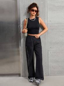SHEIN Set due pezzi stile strada, pantaloni larghi con tasche laterali e coulisse in colore nero e canotta di colore unito senza maniche, adatto per ragazze adolescenti