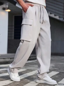 Manfinity Homme Pantalones largos casuales sólidos y versátiles de pierna recta y holgados de Manfinity, pantalones cargo, pantalones blancos para hombre