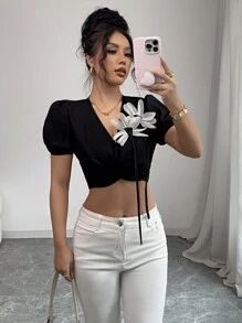 Chiquease 女装3D碎花性感可爱派对情人节约会聚会休闲度假旅游蝴蝶结扭结多种穿法2025夏季新款黑色泡泡袖短袖女上衣 - 黑色 - 查看 6