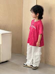 2pcs/Set Tie Dye Design Young Boy Casual Loose Fit Round Neck Short Sleeve T-Shirt And Solid Color Drawstring Waist Pockets Cargo Pants Outfit