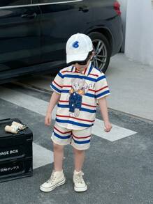 SHEIN 2 Pieces Set Of Young Boy Leisure Academy, Comfortable, Fashionable, Simple, Practical, Versatile, Japanese And Korean Loose Fit, Cute, Soft And Comfortable. The Striped Belt With Cartoon Bear Cute Pattern Is Breathable And Comfortable. The Short Sleeved Shorts Are Suitable For Daily Use, Suitable For School, Suitable For Travel, Suitable For Sports, Suitable For Spring And Summer Seasons