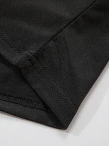 Pigiama da ragazzo pre-adolescente, con pantaloncini e maglia a maniche corte con stampa di controller di gioco grafico