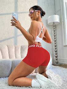 Core Rhythm Quần short chạy bộ thể thao yoga cạp chun chữ cái cho nữ, quần short tập gym, quần short đi xe đạp - Đỏ - Xem 6