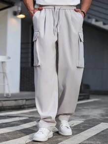 Manfinity Homme Pantalones largos casuales sólidos y versátiles de pierna recta y holgados de Manfinity, pantalones cargo, pantalones blancos para hombre