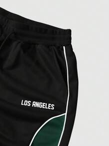 Manfinity EMRG Quần nỉ cạp rút họa tiết chắp vá màu tương phản thường ngày cho nam - Nhiều màu - Xem 7