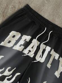 Manfinity EMRG 男士字母和火焰印花抽绳腰短裤，适合健身图案男士短裤