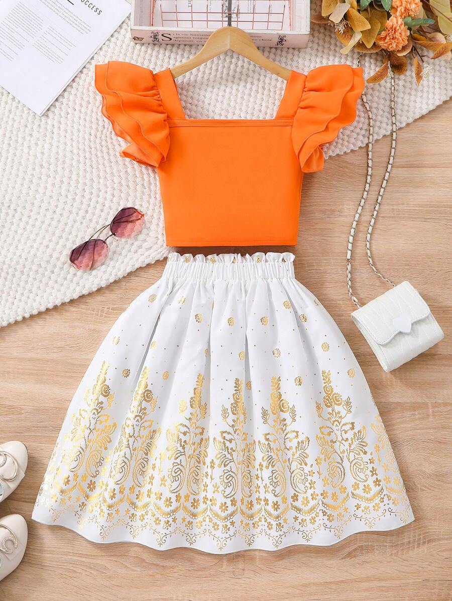 Set ragazza pre-adolescente con top a maniche corte monocolore e gonna con stampa in finitura metallica