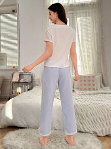 2 件套青少年女孩休闲优雅白色短袖上衣，带蝴蝶结细节，蓝色条纹裤，带蕾丝下摆，家居服