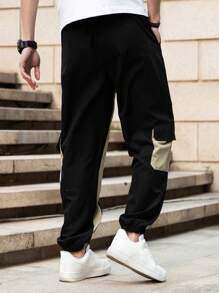 Manfinity EMRG 男士简约时尚休闲裤，日常百搭单品，街头风裤子，拼接口袋设计，适合送给丈夫、男友或朋友。