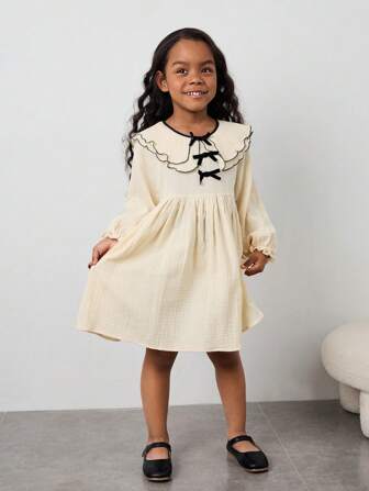 Maija Kids Maija Kids Robe décontractée ample à col claudine double couche avec nœud papillon décoratif, manches longues, pour jeune fille