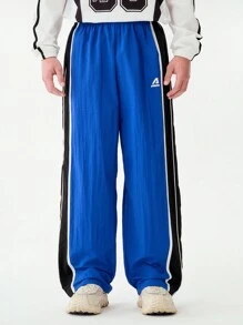 SHEIN Calça casual de perna larga com estampa de letras em bloco de cores para adolescentes