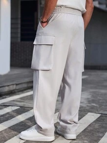 Manfinity Homme Pantalones largos casuales sólidos y versátiles de pierna recta y holgados de Manfinity, pantalones cargo, pantalones blancos para hombre