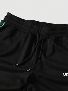 Manfinity EMRG Quần nỉ cạp rút họa tiết chắp vá màu tương phản thường ngày cho nam - Nhiều màu - Xem 6