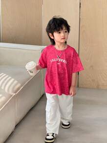 2pcs/Set Tie Dye Design Young Boy Casual Loose Fit Round Neck Short Sleeve T-Shirt And Solid Color Drawstring Waist Pockets Cargo Pants Outfit