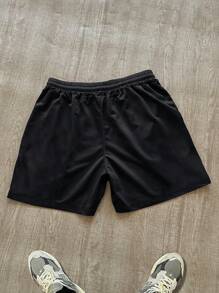 Manfinity EMRG 男士字母和火焰印花抽绳腰短裤，适合健身图案男士短裤