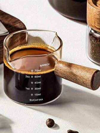 SHEIN 1pc Wooden Handle Measuring Cup Household Bar Kitchen Dining Glass Cup Double Mouth Milk Cup Tool Milk Jug Kitchen Dinnerware Heat-Resisting Coffee Milk Cup Glass Coffee Cup Milk Cup Italian Glass Coffee Measuring Cup, Latte Cup, Mini Milk Tank School Supplies