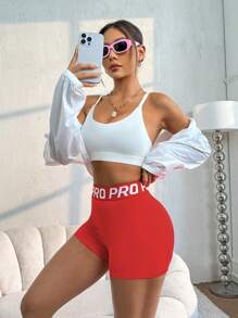 Core Rhythm Quần short chạy bộ thể thao yoga cạp chun chữ cái cho nữ, quần short tập gym, quần short đi xe đạp - Đỏ - Xem 3