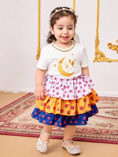 SHEIN 2 件套女婴卡通图案短袖 T 恤和花卉印花迷你裙套装，夏季