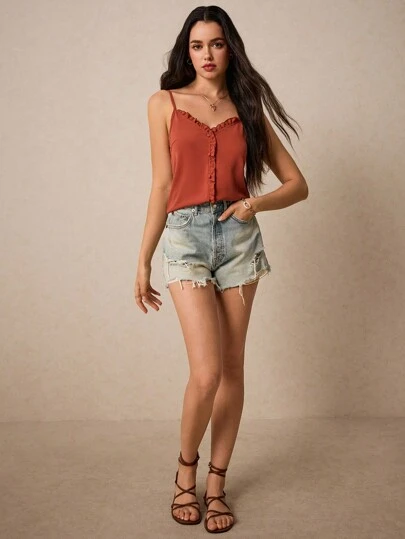 Poéselle Women's Solid Colored Tank Top With Ruffle Hem And Button Detail