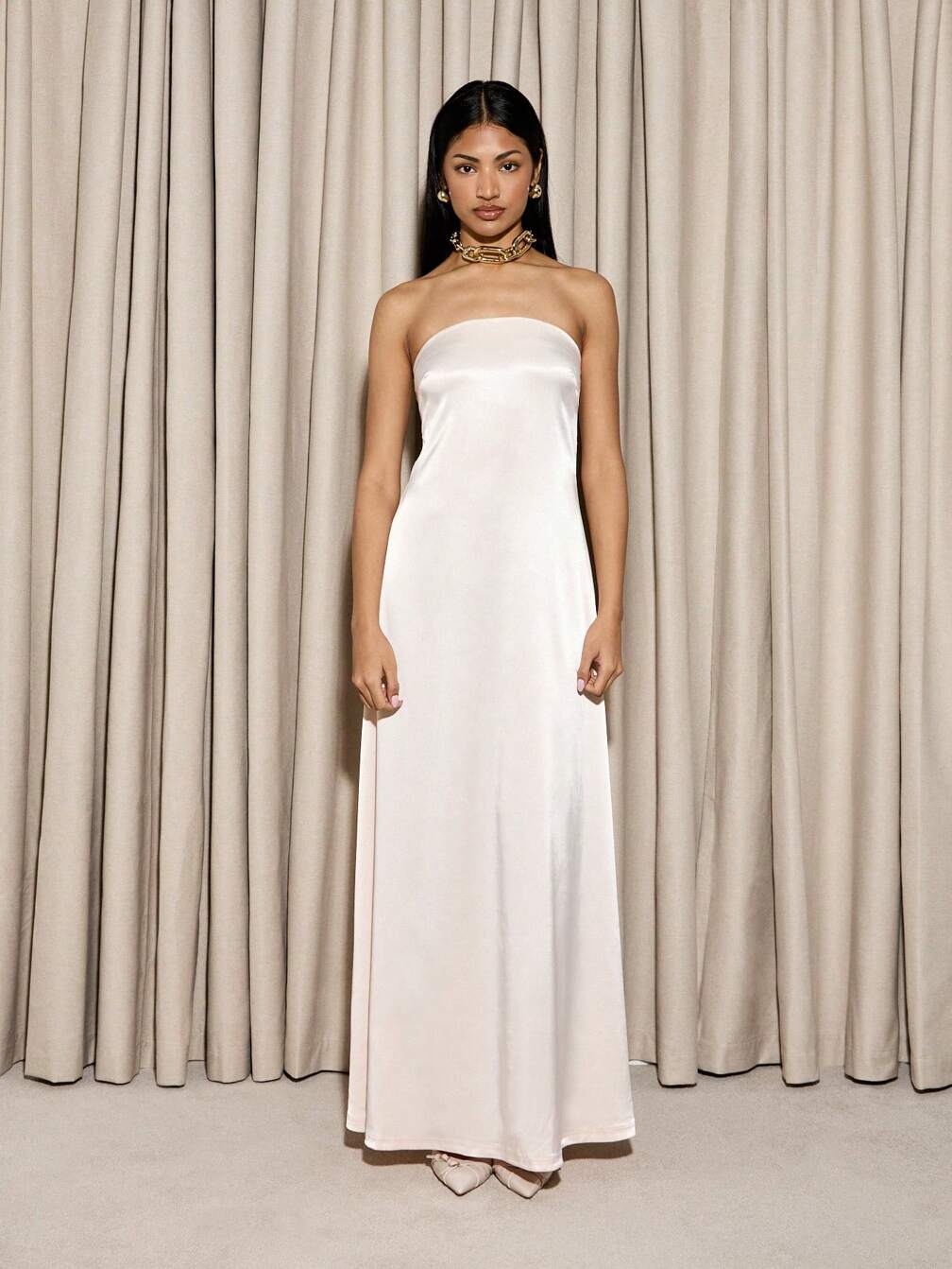 strapless satin maxi dress Encore Olive Her fitted bodice Black Satin Strapless Cowl Back