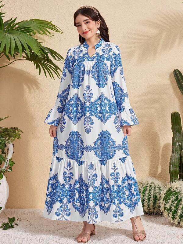 Elegante jurk met bloemenprint en losse V-hals en lange mouwen voor tienermeisjes, geschikt voor vakantie
