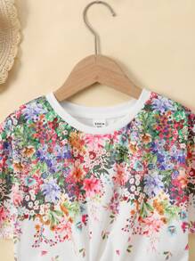 SHEIN تي شيرت فضفاض مطبوع بزهور مكشكش في الأطراف للفتيات المراهقات