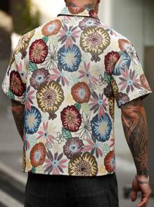 Manfinity Homme Men's Casual Daily Wear, Perfect For Seaside Vacations, Featuring An INS-Style Loose Casual Shirt With A Creative Colorful Floral Graffiti Illustration And Asymmetrical Color-Blocking Design. This Shirt Has A Button-Up Front And Is Suited For Hawaiian Beach Getaways, Music Festivals, And Everyday Wear, Making It An Ideal Gift For Boyfriends Or Husbands