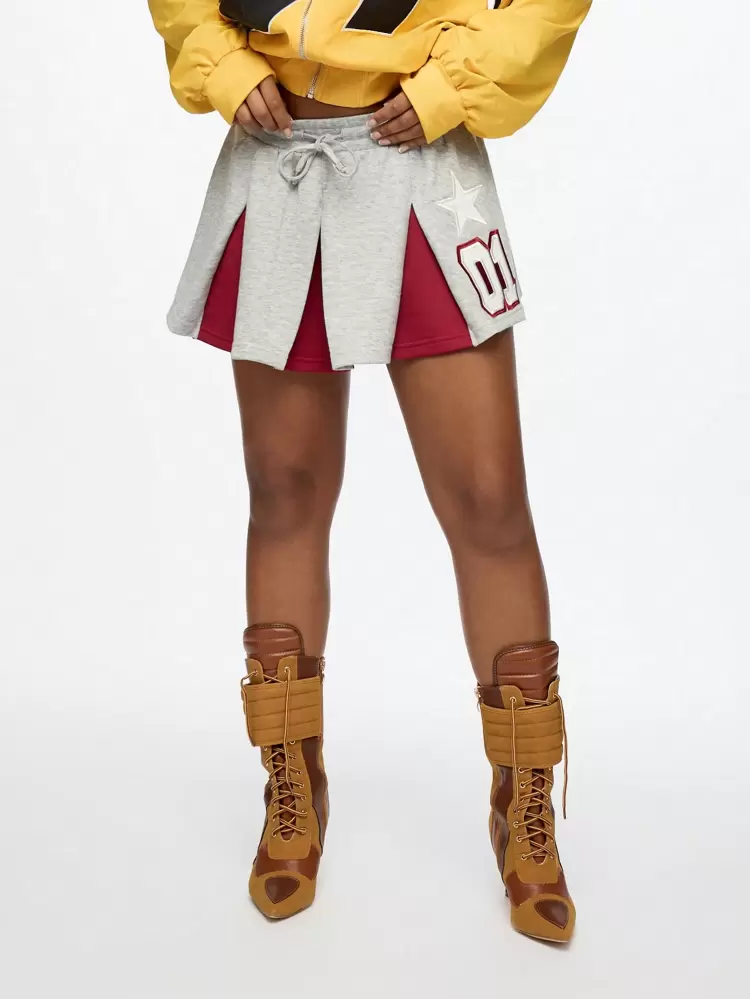 SUMWON WOMEN Split Front Pleated Mini Skirt With Star Logo