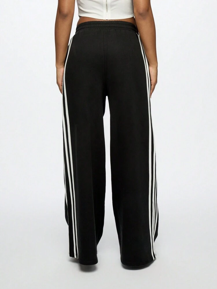 SUMWON WOMEN Pantaloni della tuta a gamba larga con strisce laterali Athleisure