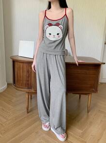 DAZY Conjunto de top holgado sin mangas y pantalón de pijama de pierna recta con estampado de dibujos animados y ribete de contraste