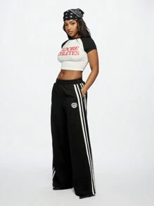 SUMWON WOMEN Athletes Crop Top Baby Tee Raglan Style Retro Athletics Gym Sports Workout Tee Urban Streetwear Fashion Statement