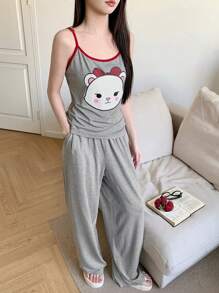 DAZY Conjunto de top holgado sin mangas y pantalón de pijama de pierna recta con estampado de dibujos animados y ribete de contraste