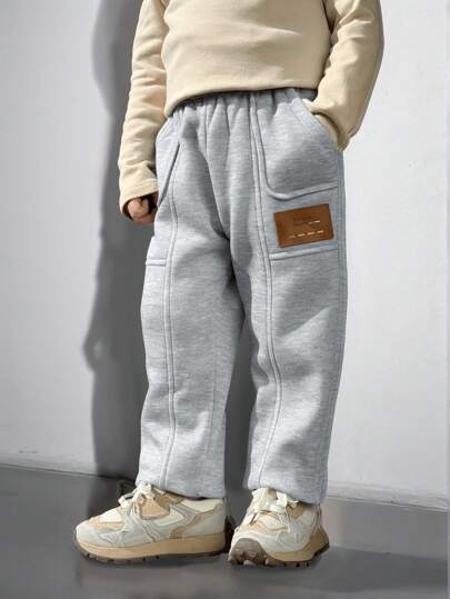 1 szt. Modne, casualowe spodnie w stylu streetwear dla młodych chłopców, dopasowane, z kieszeniami i angielskim logo, uniwersalne na wiosnę/lato, odpowiednie do codziennego noszenia, sportu, na zewnątrz, do szkoły, na imprezy, festiwale, sesje zdjęciowe