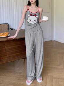 DAZY Conjunto de top holgado sin mangas y pantalón de pijama de pierna recta con estampado de dibujos animados y ribete de contraste