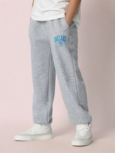 SUMWON 青少年男童运动休闲裤，饰有奥克兰大学标志图案，舒适抓绒面料，适合学校运动队穿着，展现团队精神。