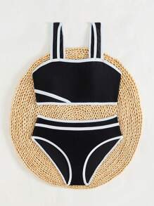 SHEIN Conjunto de traje de baño para niñas preadolescentes, diseño simple con tirantes ajustables, 2 piezas, contraste de color negro y blanco, estilo minimalista y de moda, adecuado para nadar y playa - Blanco y Negro - Ver 2