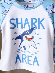 Toddler Boys' 1-3 Years Old Fashion Swimwear Set. Shark Print Sports Outfit. White Top With Light Blue Sleeves And Blue Shark Printed Shorts Set, Bright Colors, Suitable For Baby Boy's First Beach Trip And Swimming, Stretchy Fabric For Easy Movement, Perfect For Toddlers, Fashionable And Adorable Beach Look Boy Clothes For Kids Baby Boys Sets Baby Boy Beach Wear Toddler Beach Wear Boy Clothes For Baby Baby Boys Clothing Summer