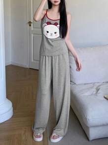 DAZY Conjunto de top holgado sin mangas y pantalón de pijama de pierna recta con estampado de dibujos animados y ribete de contraste