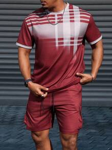 Manfinity Homme Conjunto de top casual de manga corta con cuello redondo y pantalón corto estampado para hombres de talla grande - Multicolor - Ver 1