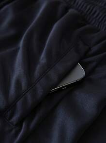 Manfinity Sport Corelite 2 Stücke Herren Einfarbig Blockfarbe Buchstaben Muster Kurzarm Top und Shorts Sport Freizeitanzug