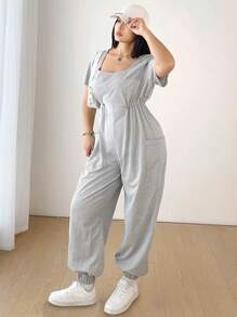 Flirla Plus Size damski sportowy kombinezon z krótkim rękawem i ściągaczem w pasie, z kieszeniami, minimalistyczny design