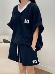 DAZY Bộ đồ thể thao nữ gồm 2 món: áo crop top cổ chữ V in số phối màu tương phản, thích hợp cho mùa xuân và hè, màu xanh navy, kiểu dáng ngắn, thích hợp mặc ở nhà. - Màu xanh hải quân - Xem 5