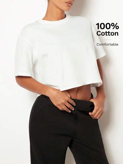 SHEIN BASICS Camiseta corta de cuello redondo, casual, de caída en los hombros y unicolor